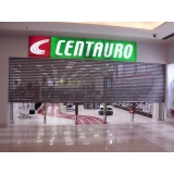 quanto custa porta de enrolar para loja em Alphaville